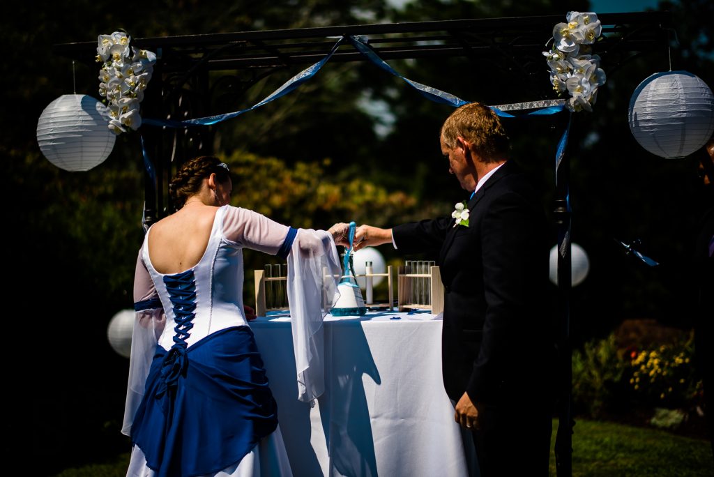 couple doing a science sand ceremony during their wedding