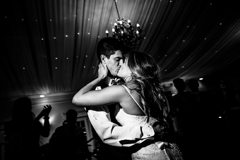 candid moment while couple is dancing