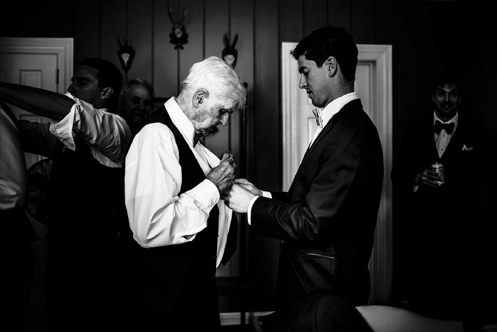grandpa getting ready with groom