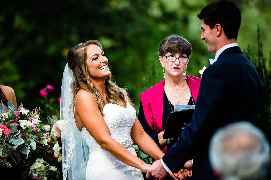 happy bride during ceremony