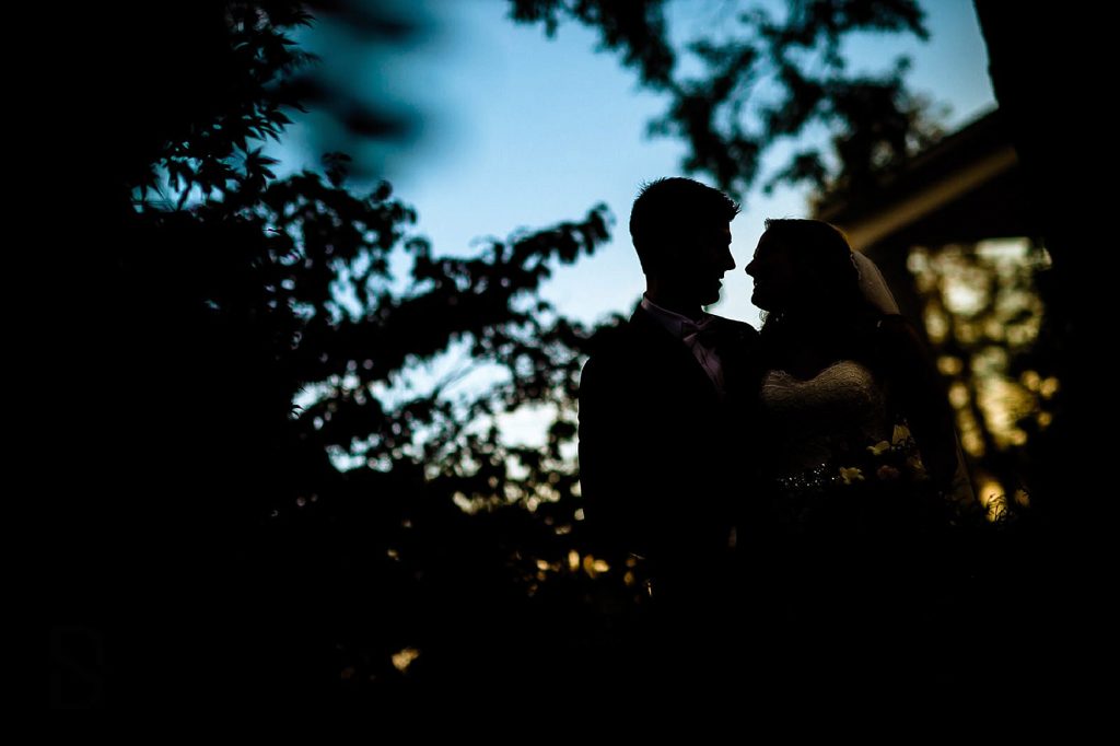 silhouette of bride and groom