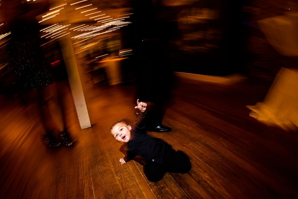 Kid having fun dancing at the stockroom