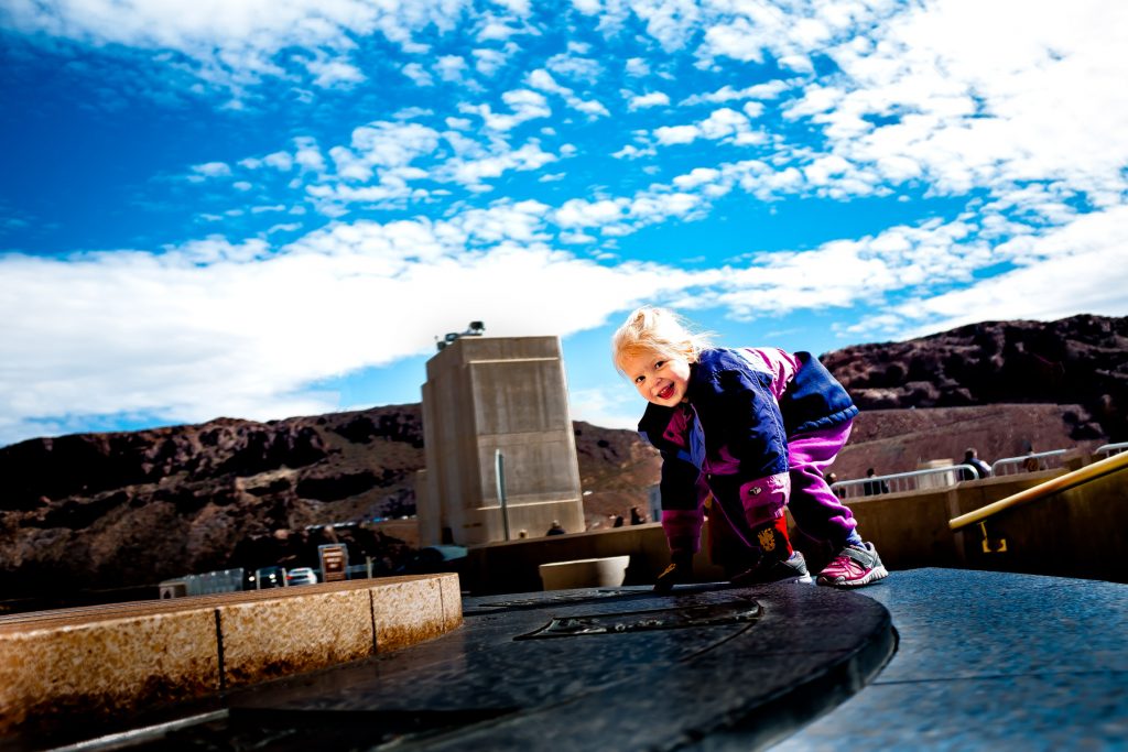 kid playing at the hoover dam