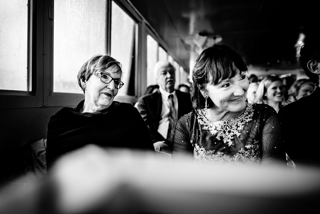 happy parents watching ceremony